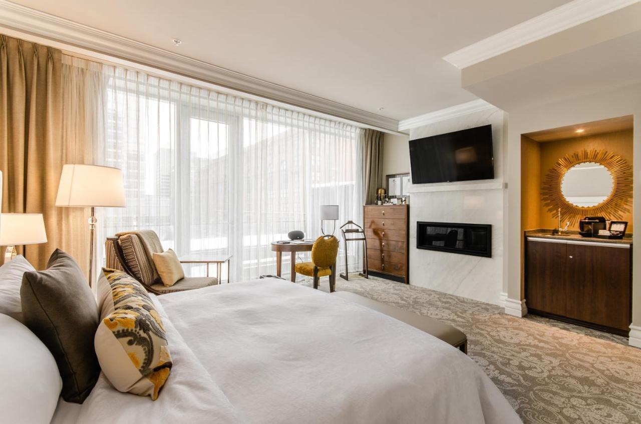 호텔 버크스 몬트리올 외부 사진 A guest room at the Hotel de Ville